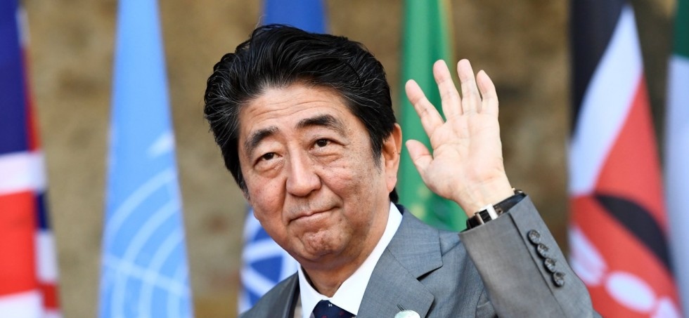Abe weighed down by scandal 