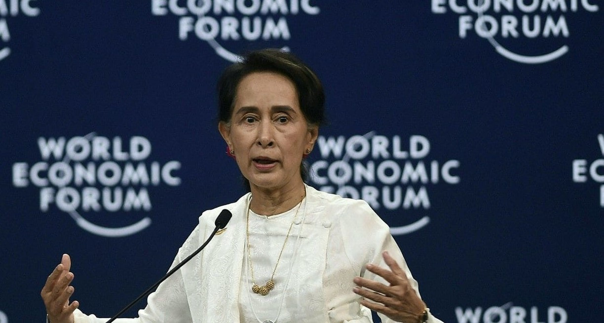 Suu Kyi defends arrest of journalist